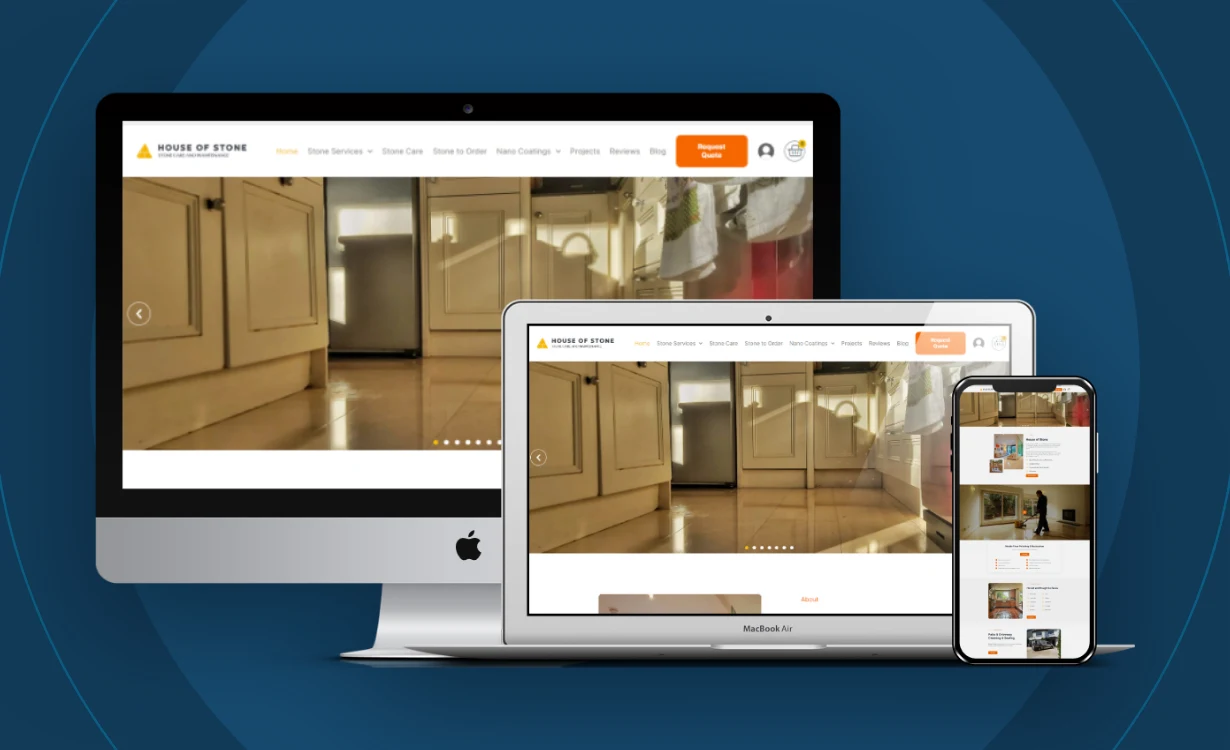 House of Stone construction website shown on a laptop